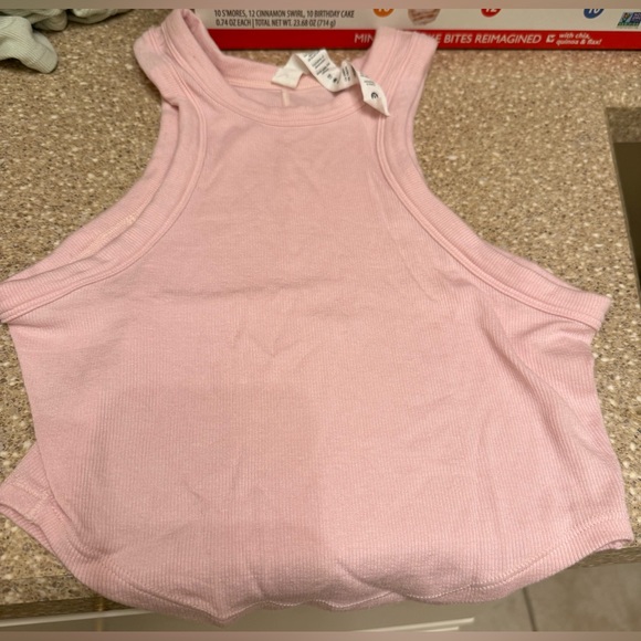 lululemon athletica Tops - Lululemon Hold Tight Cropped Tank Top Flush
Pink size 2 Brand new w/out tags.
